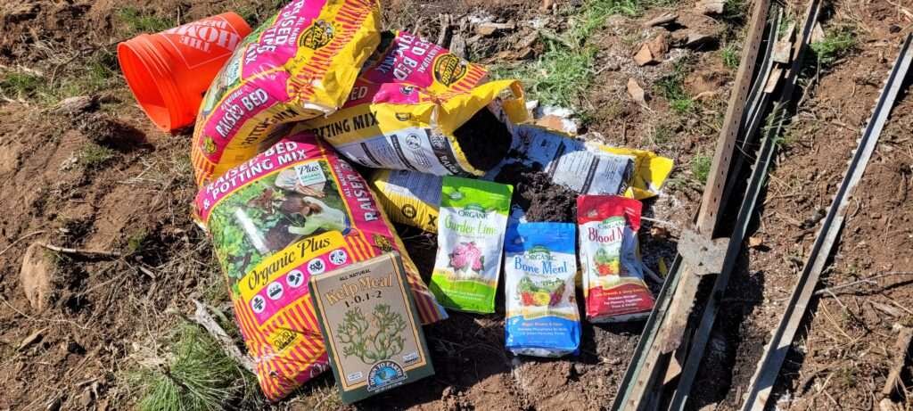 Amendments to create super soil for the dryland hugelkultur planting bed.