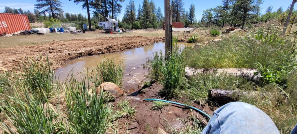 Doubling the size of the pond at Stony Oasis Farms.